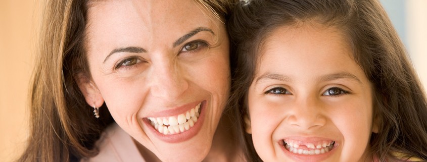 mother and daughter share a laugh