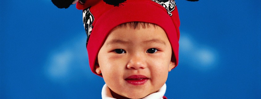 younf boy with funny knit hat