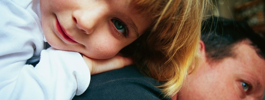 child on back of adult