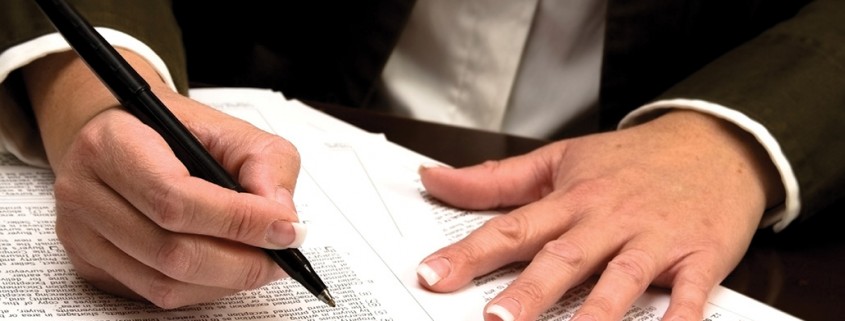 closeup of woman reviewing documents