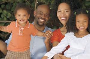 family of four outdoors