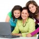 three women at a laptop computer