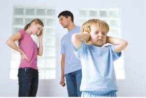 child covering ears while parents argue