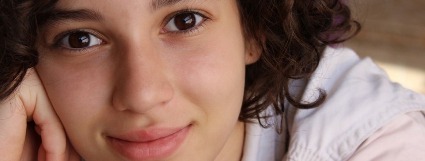 close-up of teen girl smiling