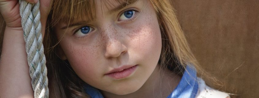 thoughtful girl in shadows