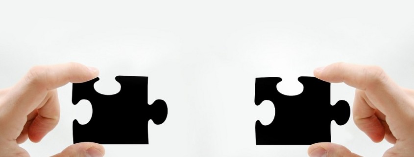 two pieces of a puzzle coming together