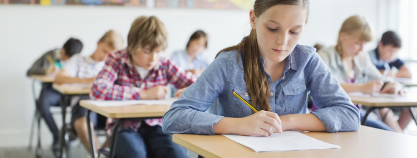 Students taking a test in classroom