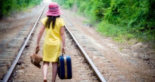 runaway girl on railroad tracks