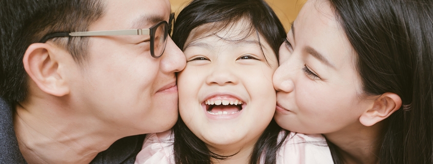 Asian family of three